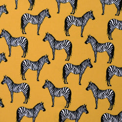 Zebra Print on Athletic Gold Poly Spandex Fabric | (4 Way Stretch/By The Yard)